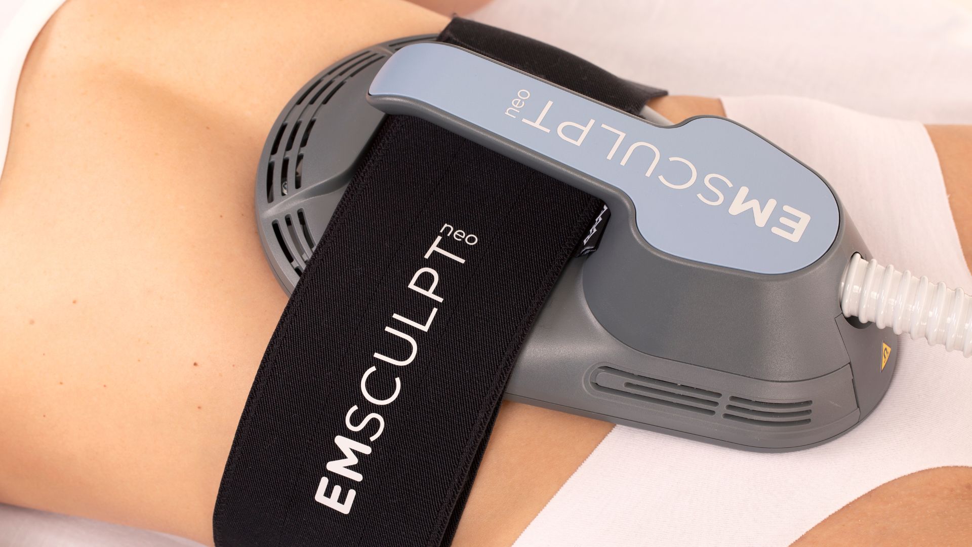 Emsculpt Neo device treatment on abdomen